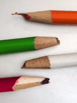 Photo of Example of soft, wax based colored pencils that were not sharpened properly
